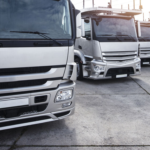 group-trucks-parked-row